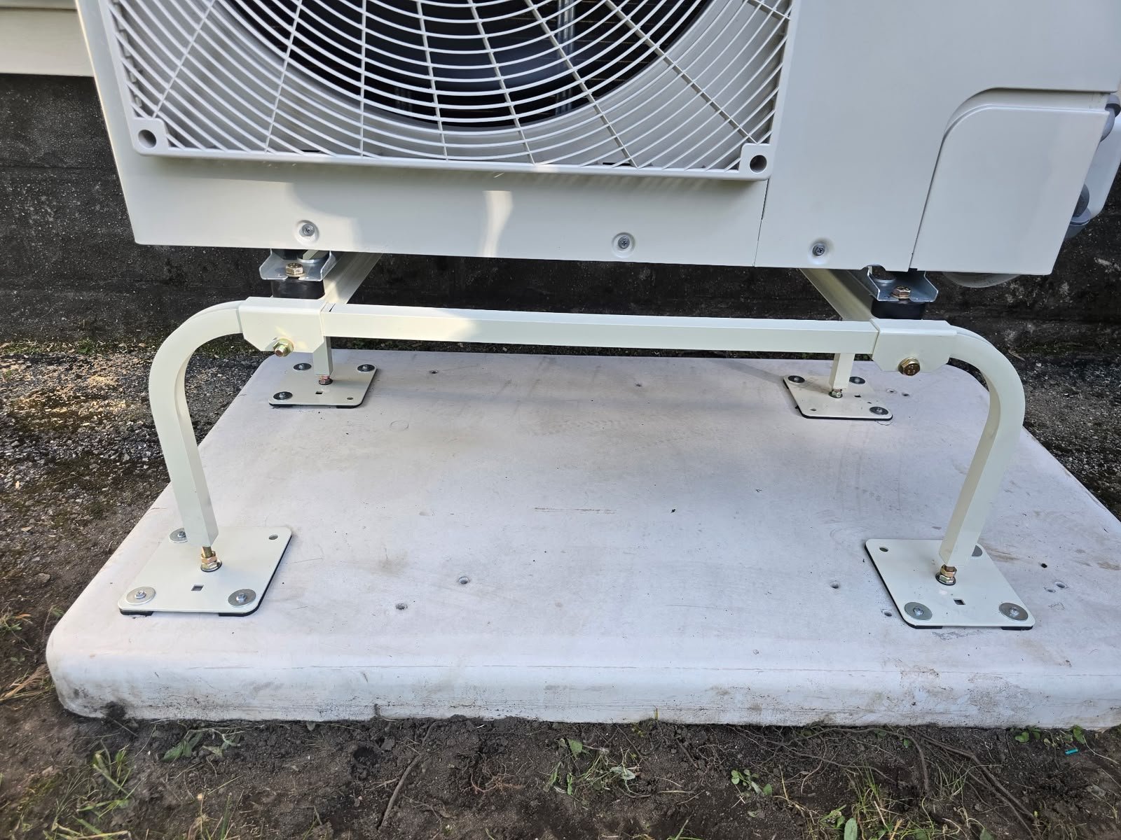 Side view of the outdoor ductless unit and its lineset